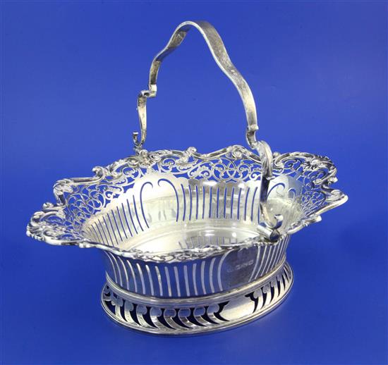 A George V pierced silver fruit basket by Mappin & Webb, 27 oz.